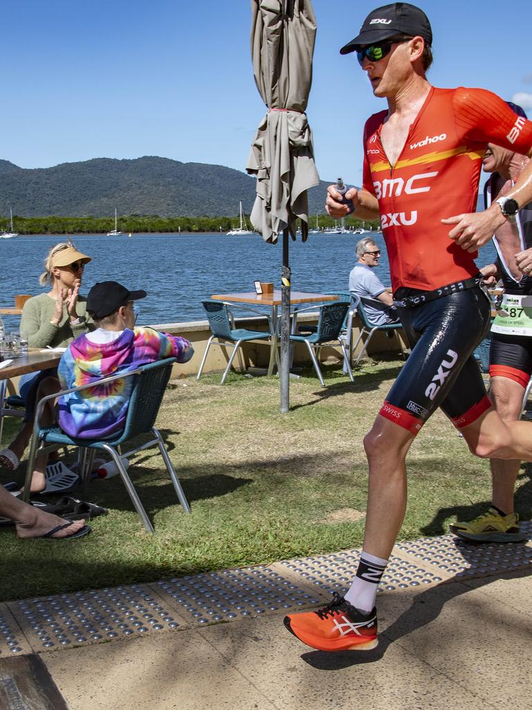 Cairns Iron Man - Max Neumann on the water front during the run leg. Picture: Brian Cassey