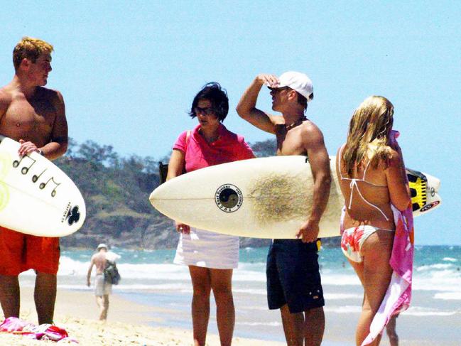 Prince Harry with friends at Noosa Beach during visit to Australia Dec 2003. british royalty