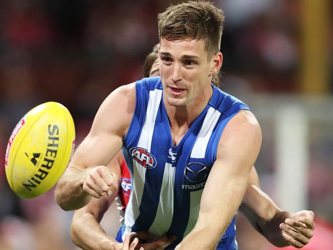 SYDNEY, AUSTRALIA - MAY 05:  Shaun Atley of the Kangaroos handpasses the ball during the round seven AFL match between the Sydney Swans and the North Melbourne Kangaroos at Sydney Cricket Ground on May 5, 2018 in Sydney, Australia.  (Photo by Mark Metcalfe/Getty Images)