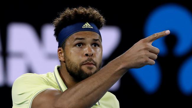 France's Jo-Wilfried Tsonga gestures as he argues with the chair umpire Jake Garner during his third round match against Australia's Nick Kyrgios. Photo: AP