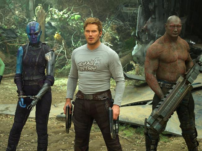 This image released by Disney-Marvel shows Zoe Saldana, from left, Karen Gillan, Chris Pratt, Dave Bautista and Rocket, voiced by Bradley Cooper, in a scene from, "Guardians Of The Galaxy Vol. 2." (Disney-Marvel via AP)