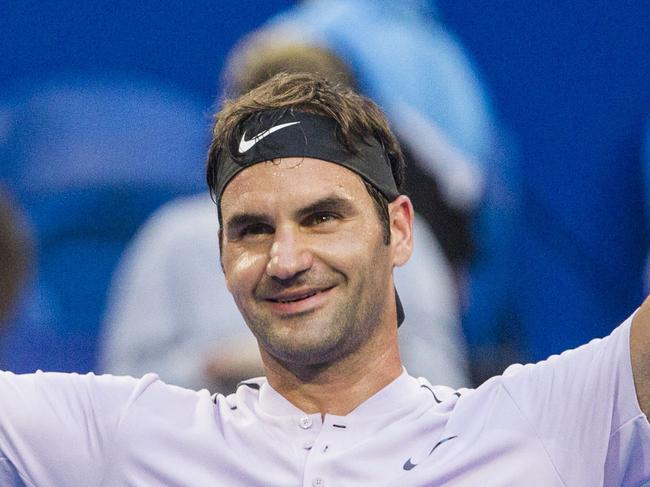 Roger Federer of Switzerland celebrates his win during the men's singles match between Roger Federer of Switzerland and Karen Khachanov of Russia on day 4 of the Hopman Cup tennis tournament at Perth Arena Perth, Tuesday, January 2, 2018. (AAP Image/Tony McDonough) NO ARCHIVING, EDITORIAL USE ONLY