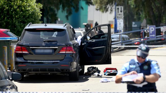 Death scene ... Hawi’s Mercedes outside the Rockdale gym. Picture: Toby Zerna