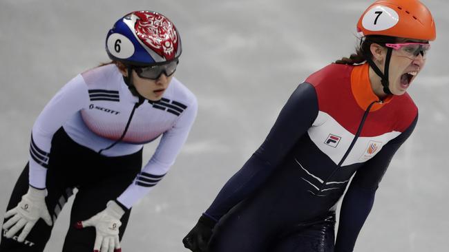 Suzanne Schulting of the Netherlands reacts as she crosses the finish line ahead of Choi Minjeong of South Korea. Picture: AP