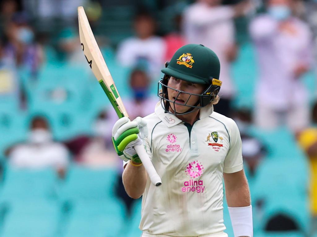 Will Pucovski celebrates after scoring a half-century.