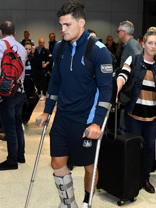 Nathan Cleary on crutches after Game II. Player: AAP