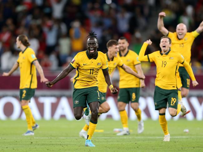 The Socceroos celebrate their World Cup playoff success against Peru. Picture: Mohamed Farag/Getty Images.