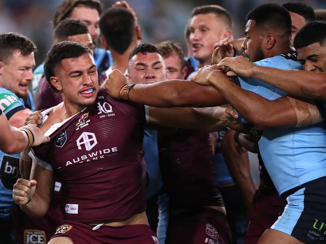 SYDNEY, AUSTRALIA - NOVEMBER 11:  Tino Fa'asuamaleaui of the Maroons and Payne Haas of the Blues scuffle during game two of the 2020 State of Origin series between the New South Wales Blues and the Queensland Maroons at ANZ Stadium on November 11, 2020 in Sydney, Australia. (Photo by Mark Kolbe/Getty Images)