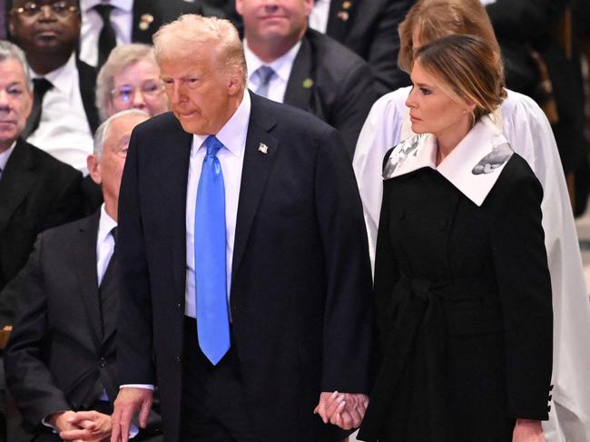 US President-elect Donald Trump and former First Lady Melania Trump arrive at the State Funeral Service for former US President Jimmy Carter. Picture: Mandel Ngan/AFP