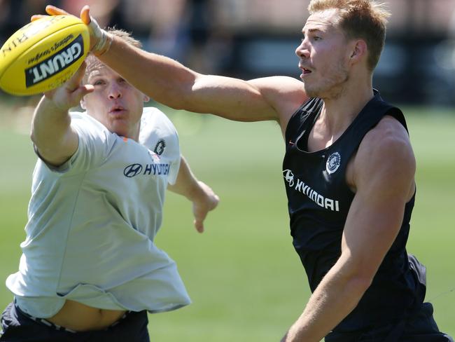 Hamish McIntosh locks horns with Harry McKay at Carlton training. Picture: Michael Klein