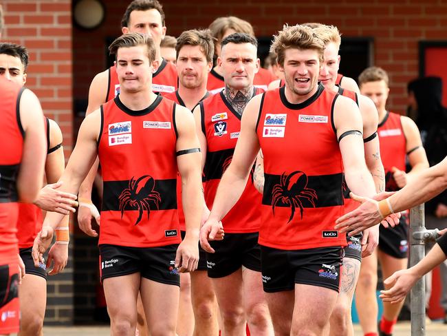 Romsey run out onto the field during the round 16 Riddell District Football Netball League 2023 Bendigo Bank Seniors match between Romsey and Macedon at Romsey Park in Romsey, Victoria on August 5, 2023. (Photo by Josh Chadwick)