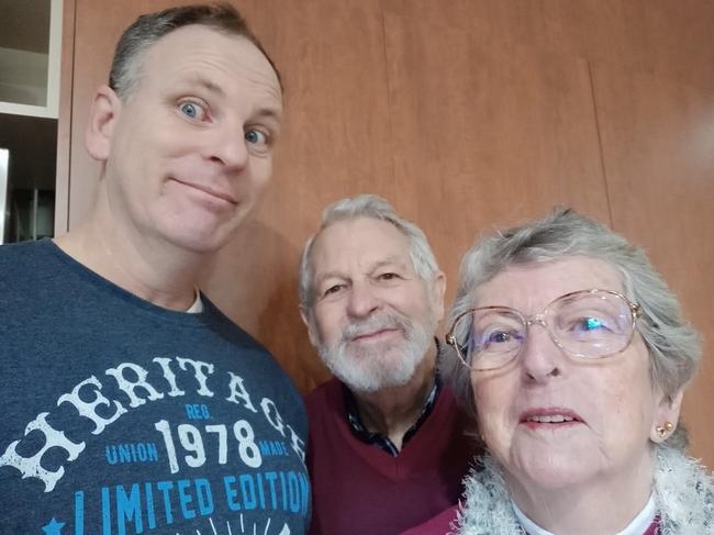 Mark Walker, pictured with parents Lyle and Zelda Walker, was unable to attend his mother's funeral.