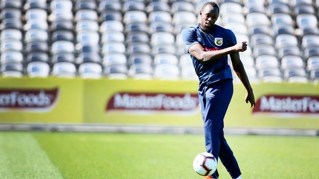 Usain Bolt in his first training session for Central Coast Mariners yesterday. Picture: AAP.
