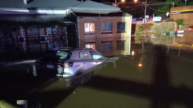 A car under water in Yarra Junction. Picture: Aven Stewart