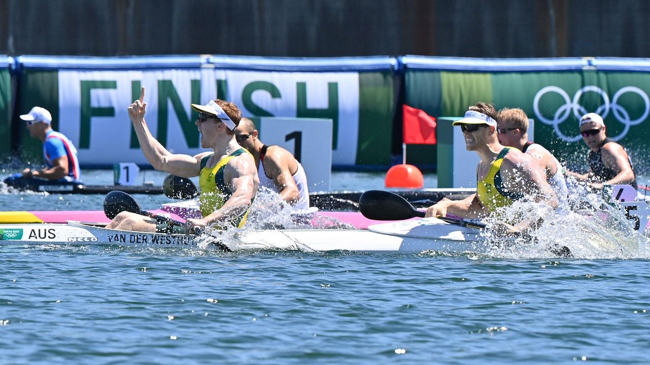 Australia's Jean van der Westhuyzen (L) and Australia's Thomas Green celebrate after winning the men's kayak double 1000m final during the Tokyo 2020 Olympic Games at Sea Forest Waterway in Tokyo on August 5, 2021. Picture: Luis ACOSTA / AFP.