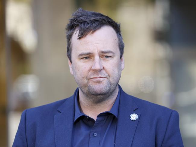 NSW Rail, Tram and Bus Union Secretary Toby Warnes pictured speaking to media outside the Fair Work Commission. Picture: NewsWire / Damian Shaw