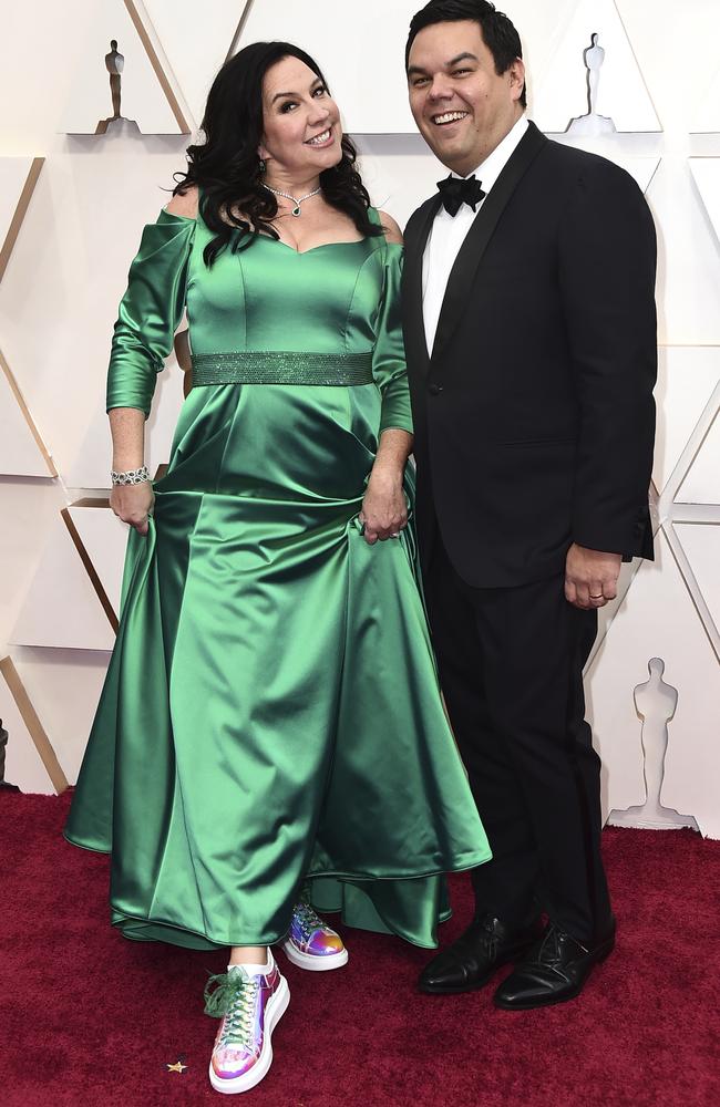 Kristen Anderson-Lopez, left, and Robert Lopez arrive at the Oscars. Picture: Jordan Strauss/Invision/AP