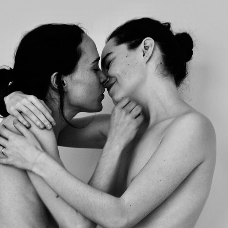 Elliot Page (left) and wife Emma Portner posed for this intimate pic last year.