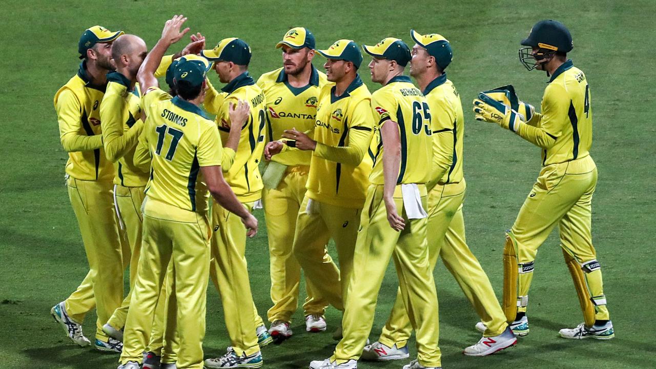 Australian players celebrate as they wrap up back to back series wins.