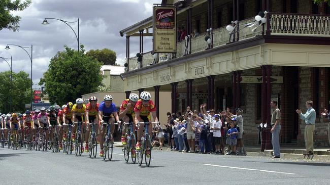 Cyclists passing the Tanunda Hotel while in the Tour Down Under in 2000. Picture: SATC