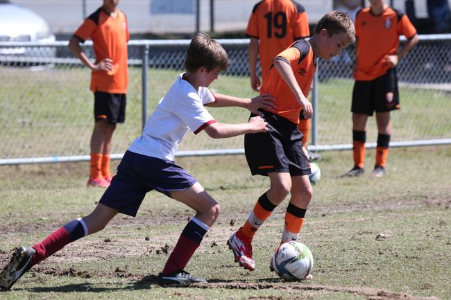The Premier Invitational football tournament on the Gold Coast. TSS v Brisbane Roar under-13s in action. Picture: Mike Batterham.