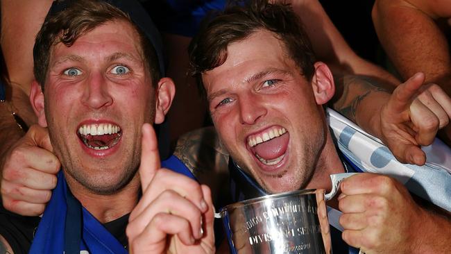 Robbie Ross and Jarrod Bayliss celebrate with the 2015 premiership trophy. Picture: Colleen Petch