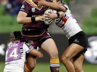 STAR FORWARD: Steph Hancock, of the Broncos, is tackled during an NRL Women's Premiership match in Melbourne. Picture: DANIEL POCKETT