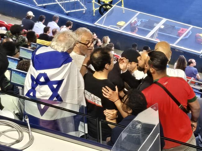 Israeli and pro-Palestinian spectators were situated just one row behind each other.