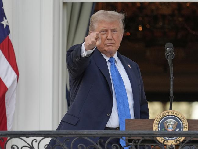 President Donald Trump gestures on the South Lawn of the White House in Washington. Picture: AP