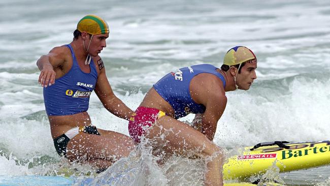 01 Apr 2001: Ky Hurst of Tugun Surf Lifesaving Club And Zane Holmes of Kawana Waters in action during the Ironman event at the Australian Surf Life Saving Championships on the Gold Coast, Australia. DIGITAL IMAGE. Mandatory Credit: Darren England/ALLSPORT