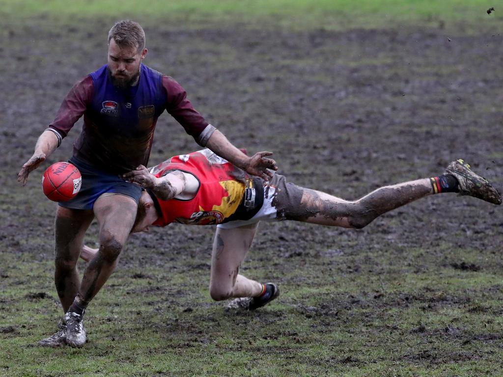 South Yarra and Hallam do battle in the mud in Southern Football League Division 4.