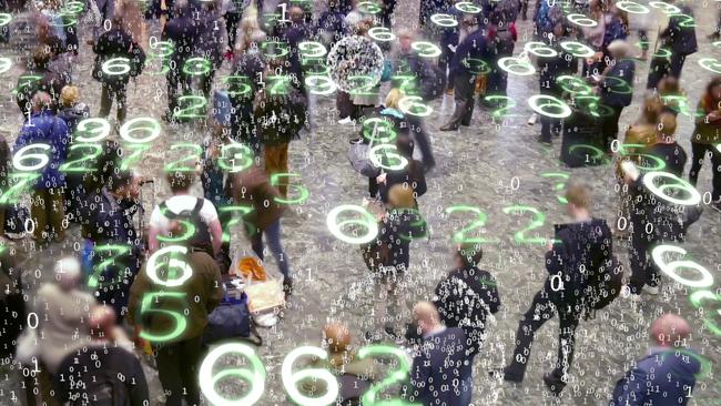 Binary code bursts from phones held by people with a matrix style overlay of glowing electronic numbers.Digital privacy generic