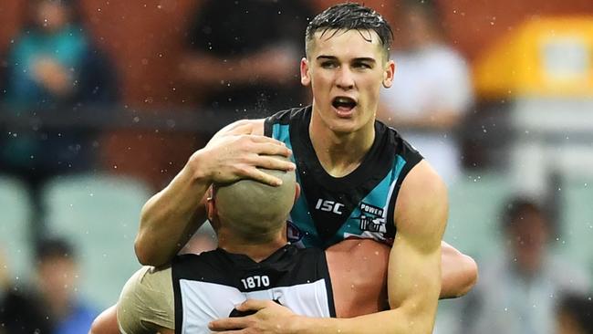 ADELAIDE, AUSTRALIA - MAY 19: Connor Rozee of Port Adelaide celebrates a goal with Sam Powell-Pepper of Port Adelaide during the round nine AFL match between the Port Adelaide Power and the Gold Coast Suns at Adelaide Oval on May 19, 2019 in Adelaide, Australia. (Photo by Mark Brake/Getty Images)