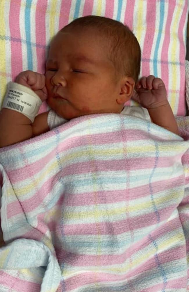 The bub was rushed to Brisbane for lifesaving medical treatment after he suffered breathing difficulties after birth.