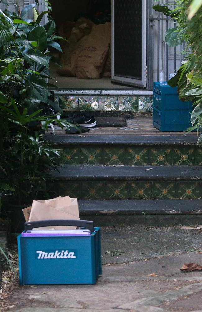 Images from the scene show bags of bread flour inside the house, and police files in a toolbox out the front. Picture: NCA NewsWire / Gaye Gerard