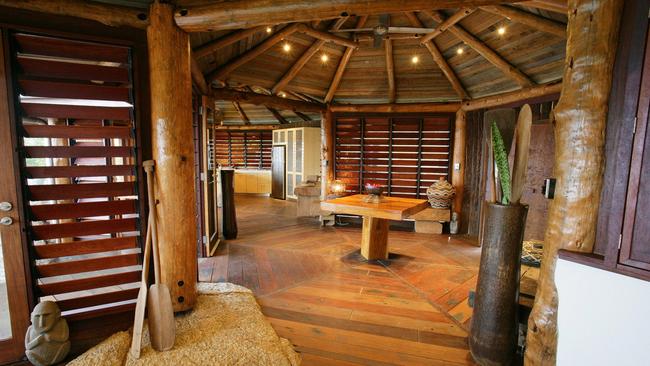 Mr Vandyke designed this home on Bedarra Island for photographer Peter Lik, which integrates large boulders into the house and bathroom design.