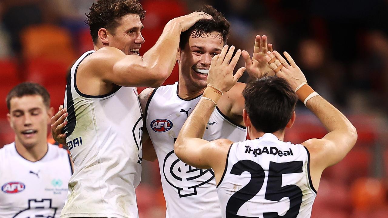 Jack Silvagni celebrates with Charlie Curnow and Zac Fisher after kicking a goal. Picture: Mark Kolbe/Getty Images