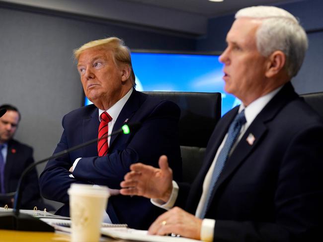 US President Donald Trump with Vice president Mike Pence during a teleconference regarding the coronavirus outbreak. Picture: Evan Vucci/AFP