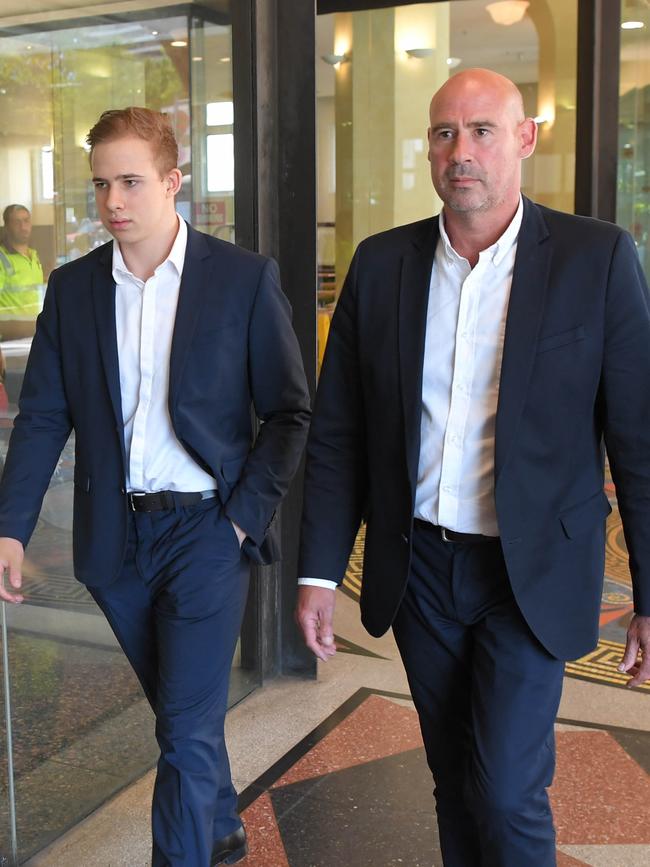 Father and son at the Downing Centre courts.