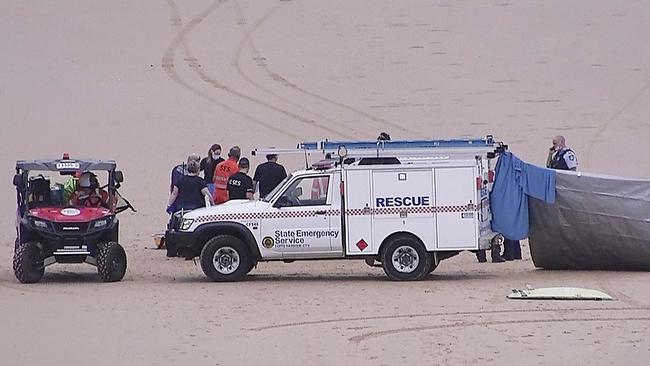 Paramedics battled to save surfer Tim Thompson who died after his arm was severed by a great white shark on Shelly Beach at Emerald Beach near Coffs Harbour on Sunday. Picture: Frank Redward