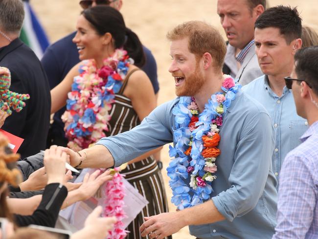 DAILY TELEGRAPH - Pictured is the Duke and Duchess of Sussex, Prince Harry and wife Meghan at Bondi Beach today on their Royal tour of Australia. Picture: Tim Hunter