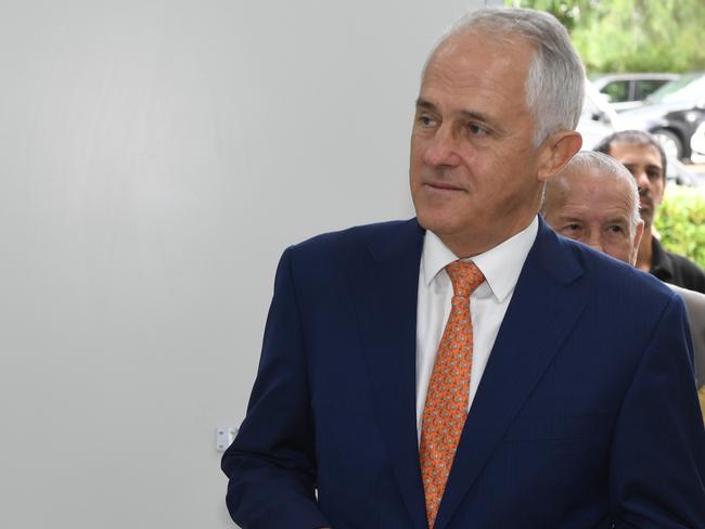 Malcolm Turnbull’s tour of a Sydney microphones factory was derailed by questions about Tony Abbott on Friday. Picture: Dean Lewins/AAP