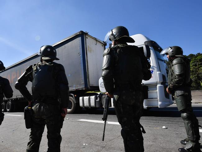 Soldiers take part in an operation to clear highway Regis Bittencourt, 30km from Sao Paulo. Picture: Nelson Almeida