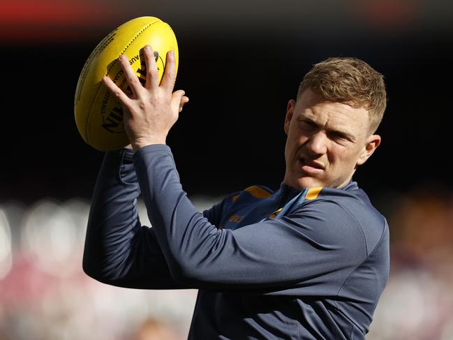 MELBOURNE, AUSTRALIA - AUGUST 20: James Sicily of the Hawks warms up before the round 23 AFL match between Melbourne Demons and Hawthorn Hawks at Melbourne Cricket Ground, on August 20, 2023, in Melbourne, Australia. (Photo by Darrian Traynor/Getty Images)