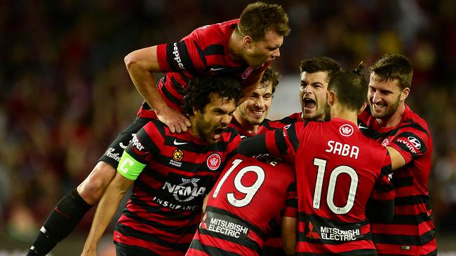 Team mates celebrate after scoring. (Getty Images)