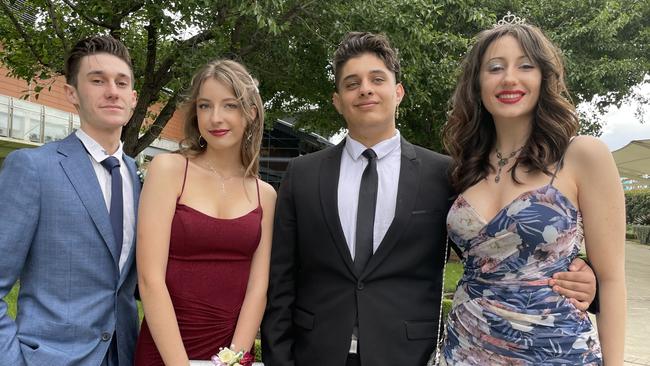 Jamie Anderssen, Molly Crocker, Ahmad Al Zameli and Charlee Nasr at the Catherine McAuley Year 12 formal at Rosehill Gardens.