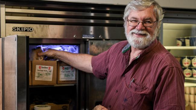 Pantry 5000 worker Ken Gooding with the new freezer the charity was able to buy with a 2017 Feed Melbourne Appeal grant. Picture: Penny Stephens.