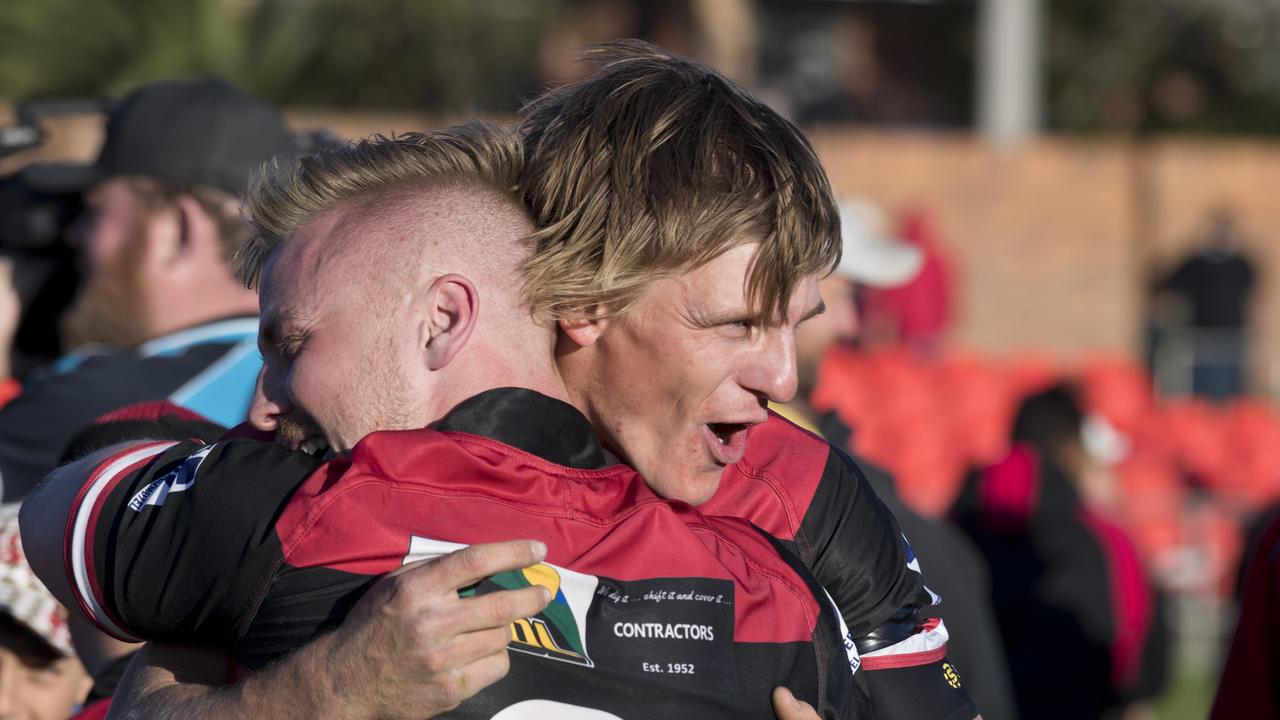 Nathan Bowering and Dylan Chown celebrate the win. TRL grand final, Valleys vs Warwick Cowboys. Sunday, 8th Sep, 2019.