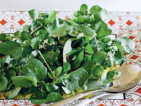 Watercress salad with honey-mustard dressing.