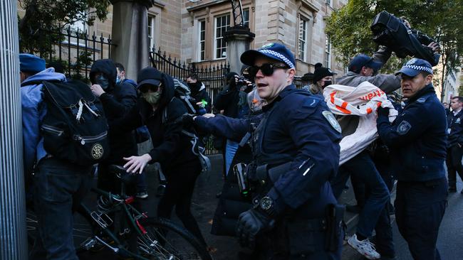 Police and protesters in the CBD on June 28. Picture: Gaye Gerard.